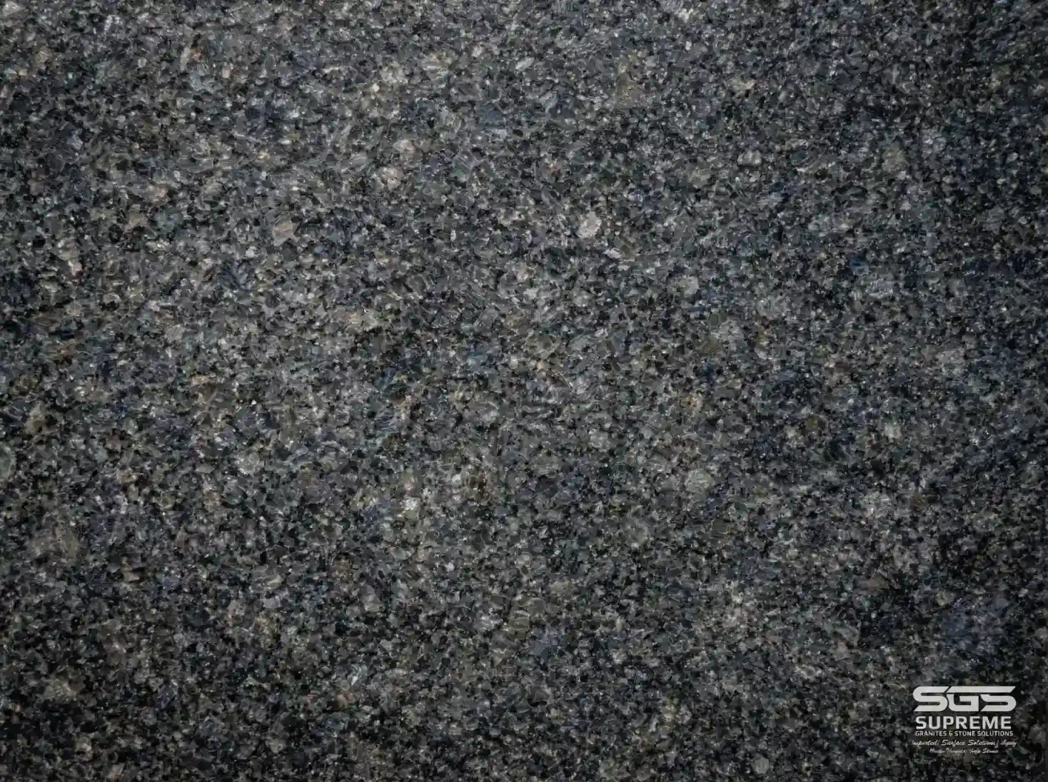 Close-up of Honey Blue granite showing dense blue-grey grain pattern with laputra finish for outdoor flooring applications