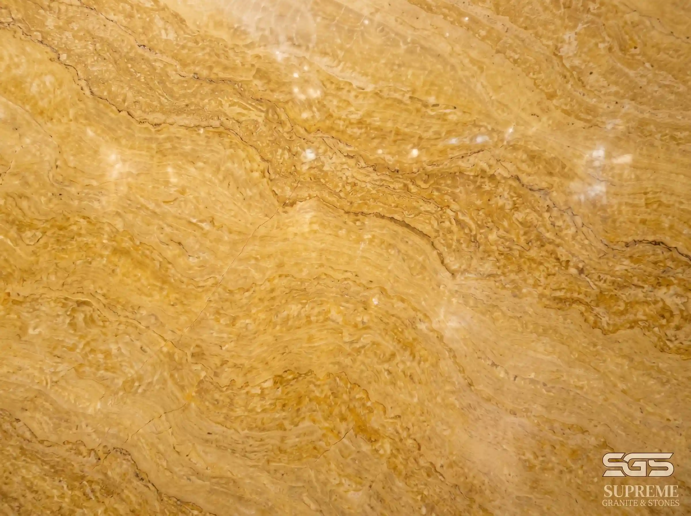 Close-up of Jaisalmer yellow marble texture showing natural golden veins and polished surface finish