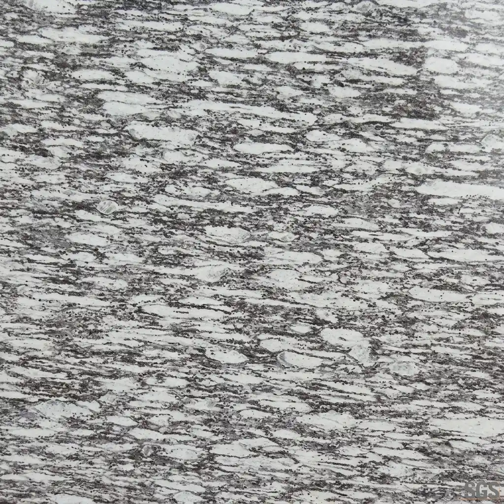 close-up texture of Mariam White Granite displaying a white background with intricate flowing grey vein patterns and natural crystalline details