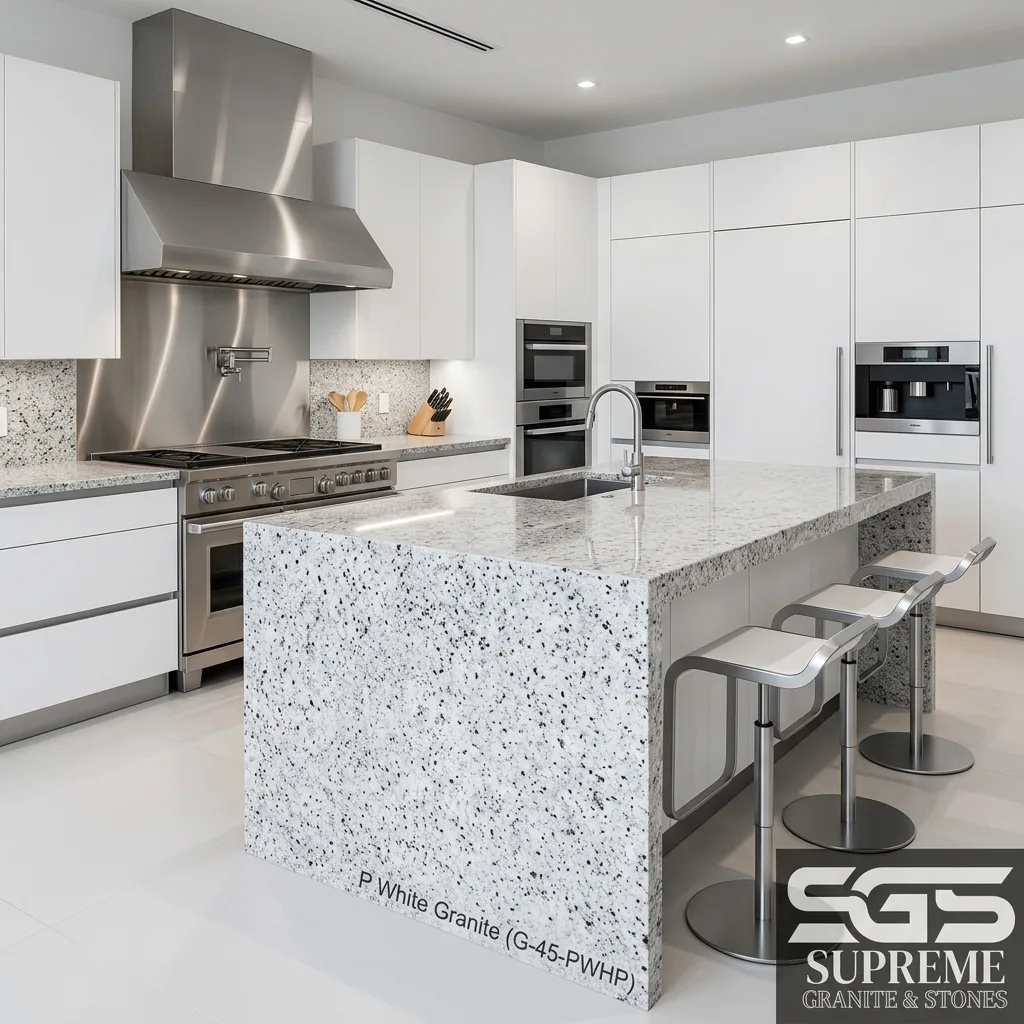 contemporary kitchen featuring Moon White Granite waterfall island and countertops with white, grey, and subtle burgundy mineral accents