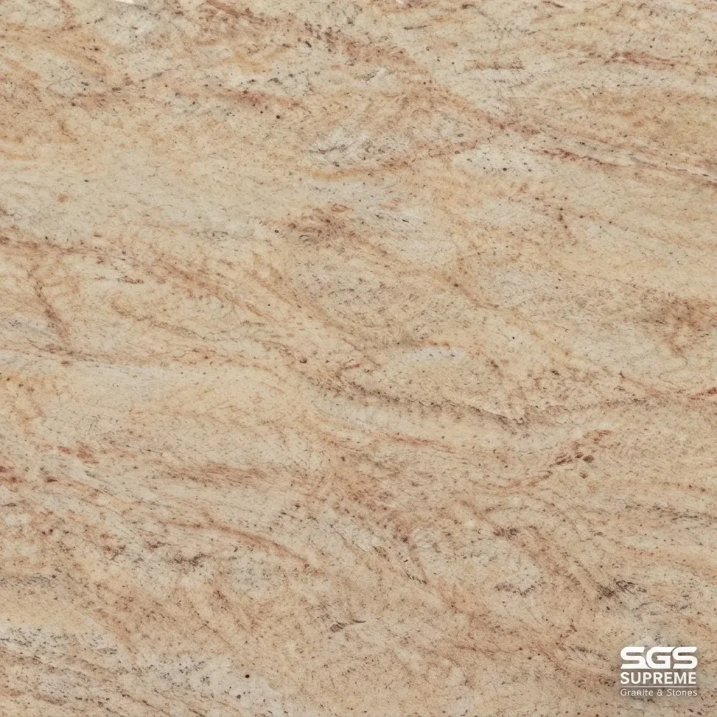 Close-up of Shiva Gold Granite with a creamy beige background, golden undertones, and natural pinkish-brown mineral patterns.