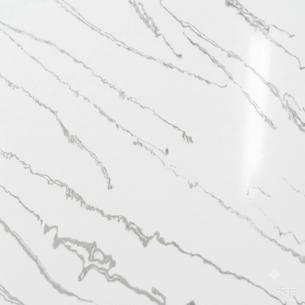 Close-up texture of Wonder Cosmic White Quartz showcasing a polished white engineered quartz surface with flowing grey marble-inspired veining, suitable for countertops, wall cladding, vanity tops, and luxury interiors.